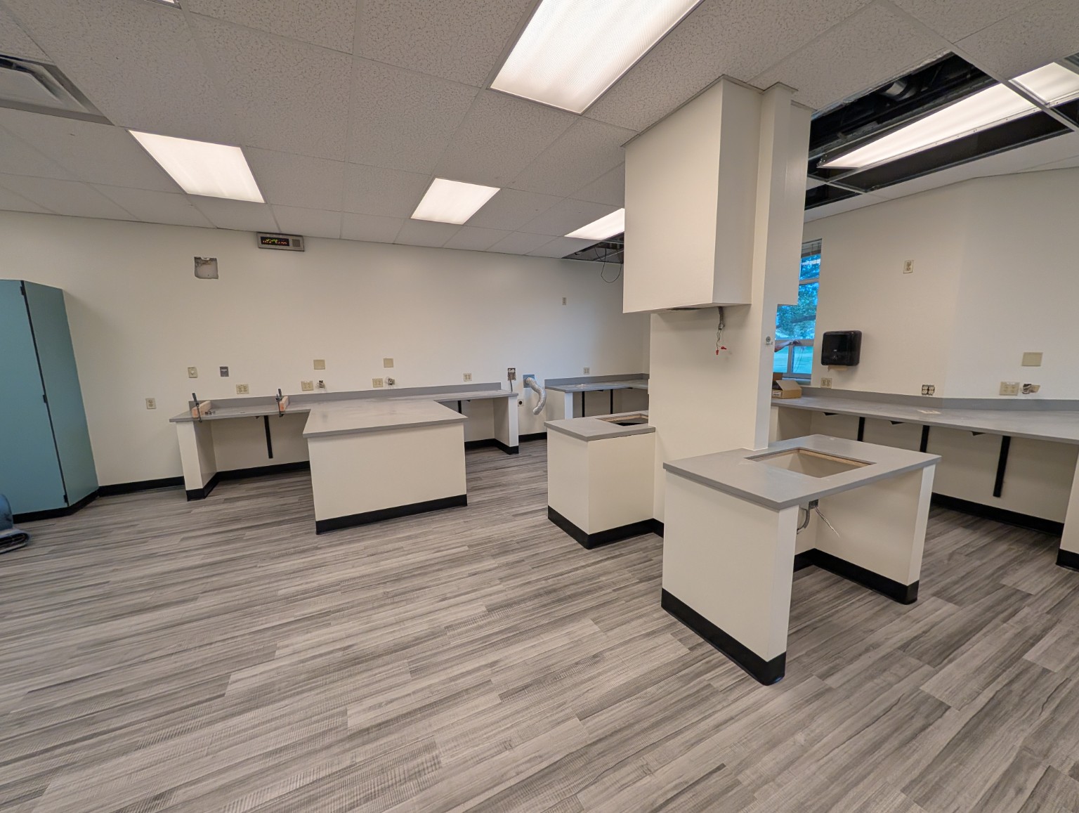 Spacious room with polished flooring